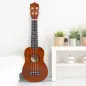 Ukelele Soprano para Principiantes con 4 Cuerdas de Nylon Ajustables Juguete educativo 53x17,5x6,2cm Marrón